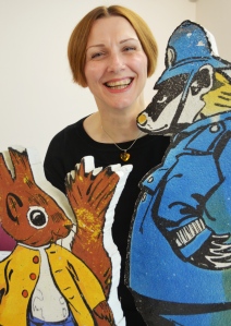 Campaigns officer Helen Halls with Tufty and Policeman Badger